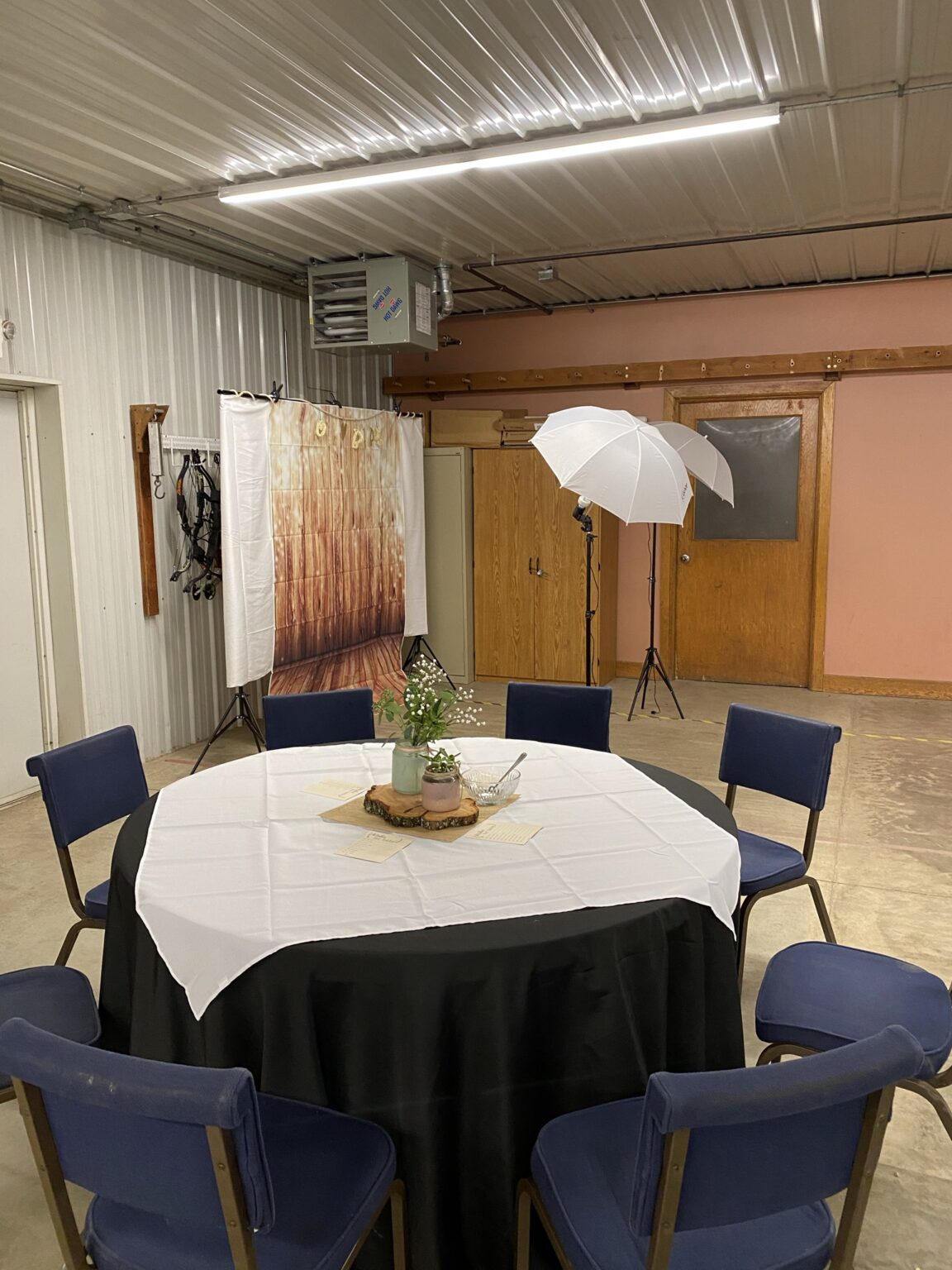 View of photo area fits in the space with the various tables.